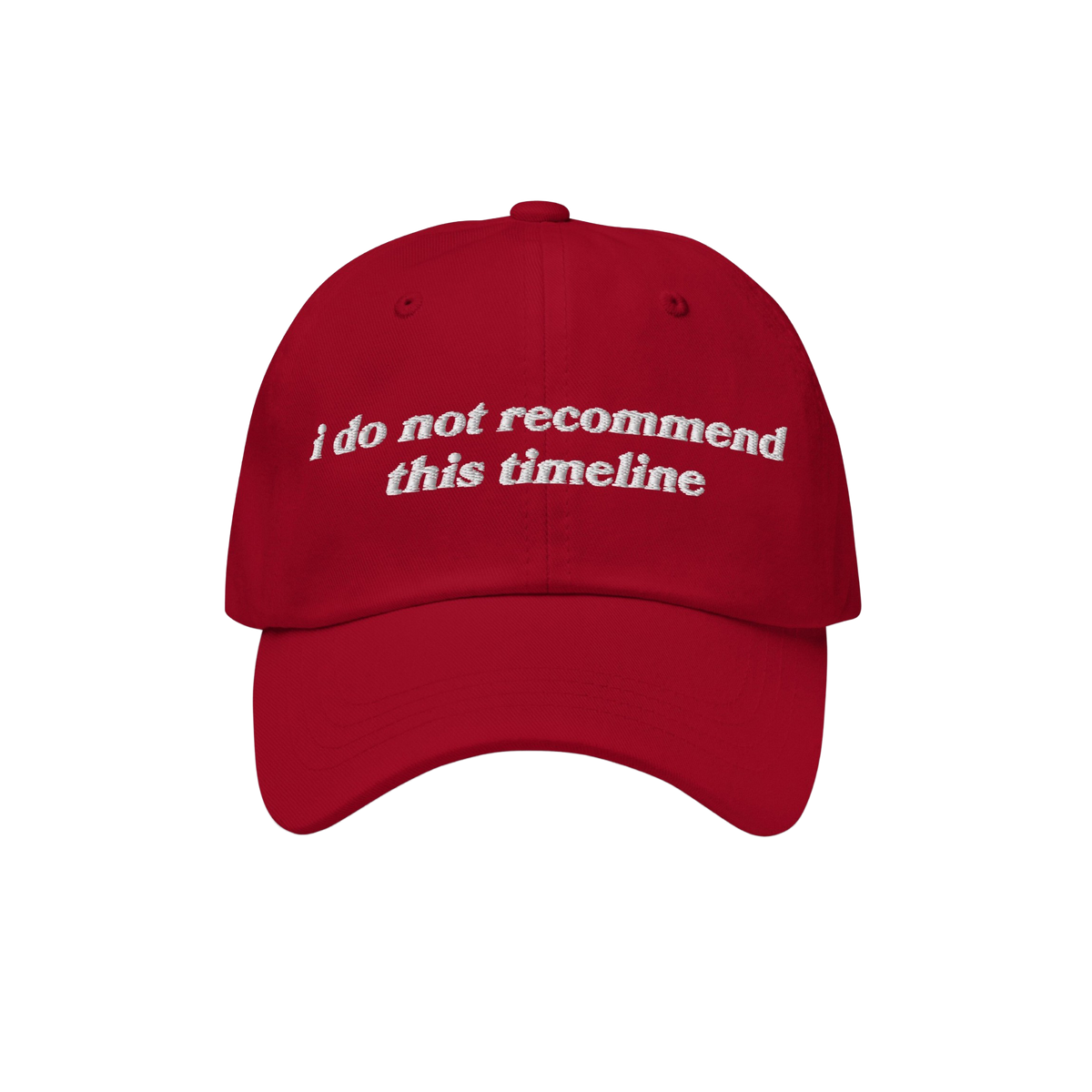 Red baseball-style cap with curved brim features I Do Not Recommend This Timeline in white embroidery, embodying Egoproof's b