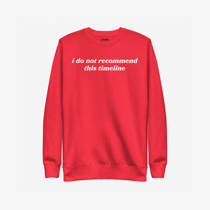 Timeline Sweatshirt EU, a red crewneck with white text, humorously expresses discontent with i do not recommend this timeline. A cozy pullover for those embracing life's absurdities.
