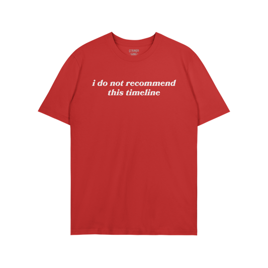Red unisex Timeline T-shirt with white text "i do not recommend this timeline" printed on the front, soft casual fit for acti