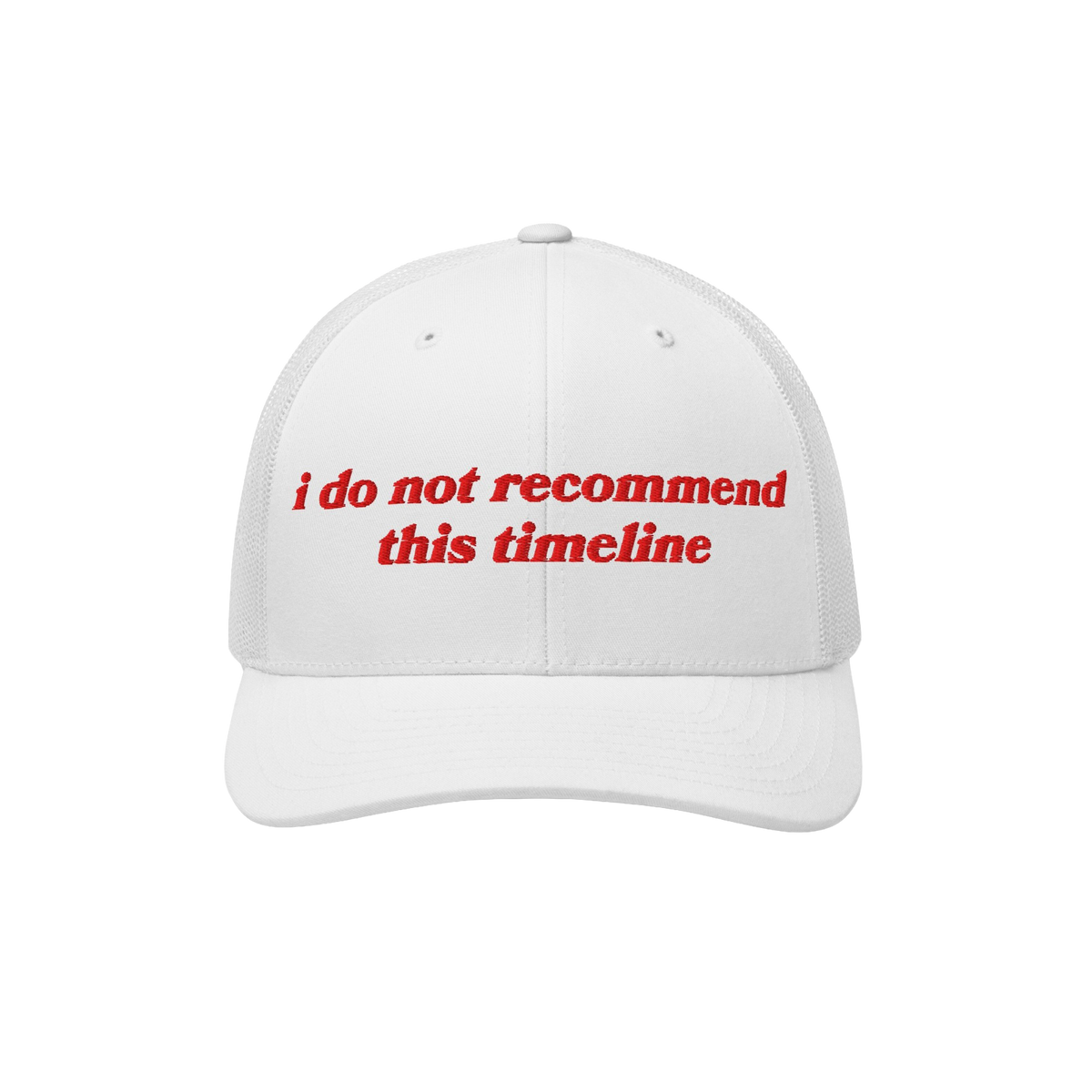 White mesh-back trucker cap with a curved brim featuring bold red embroidery: “I Do Not Recommend This Timeline.” A state